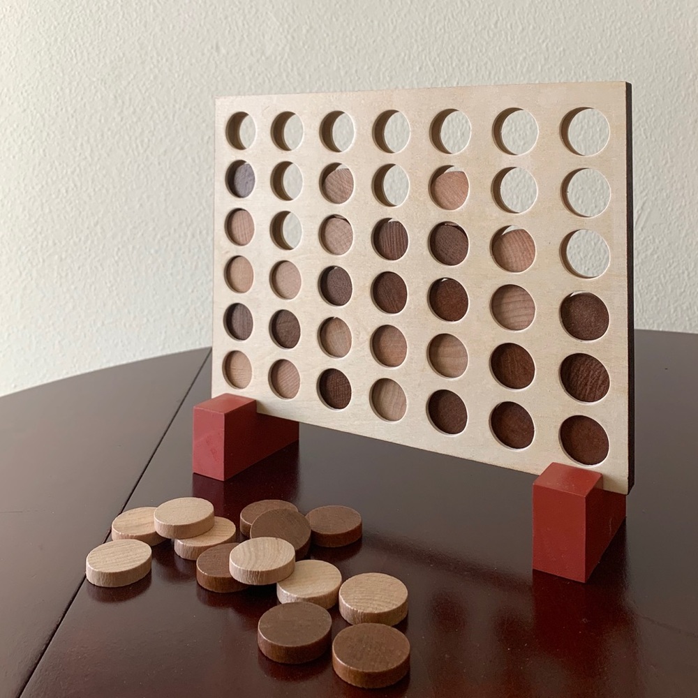 charming wooden four in a row game